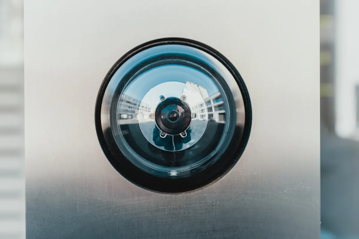 Close view of a mounted security camera lens